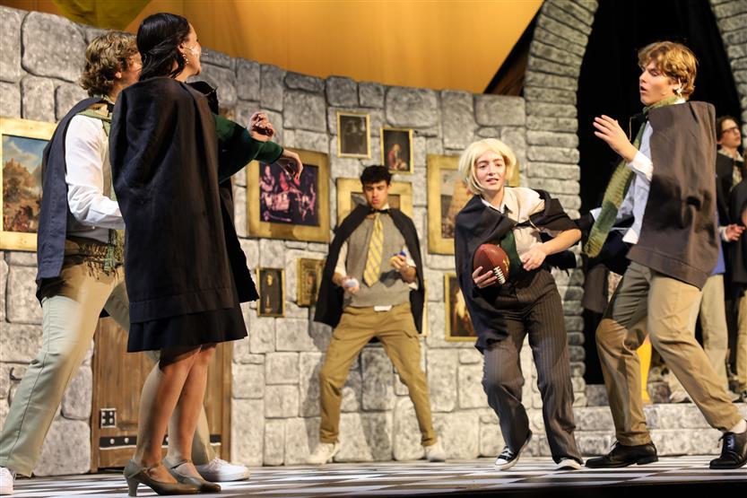 Students perform onstage
